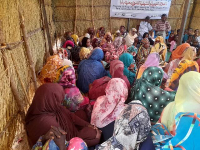 Women meeting inside community house as part of the Reversing the Flow program in Sudan